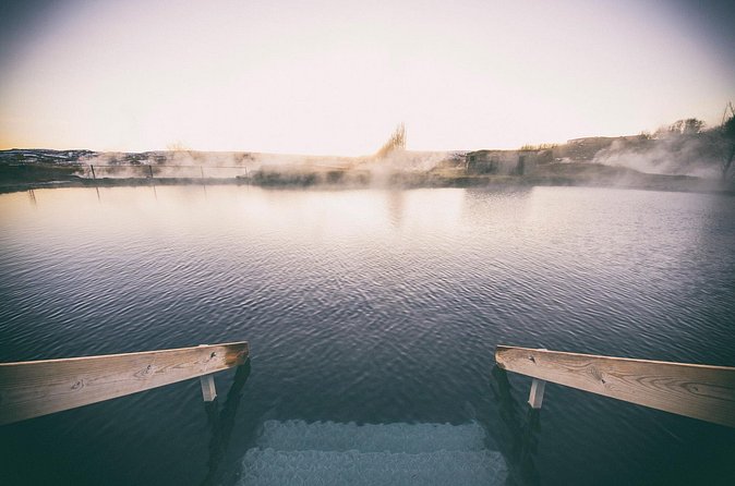 Steaming water and wooden steps at the Secret Lagoon